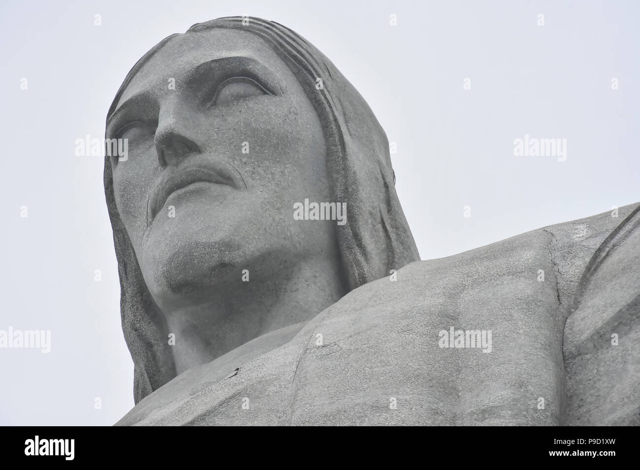 Jesus in the clouds. Big statue of christ in Rio de Janeiro, Brazil. Stock Photo