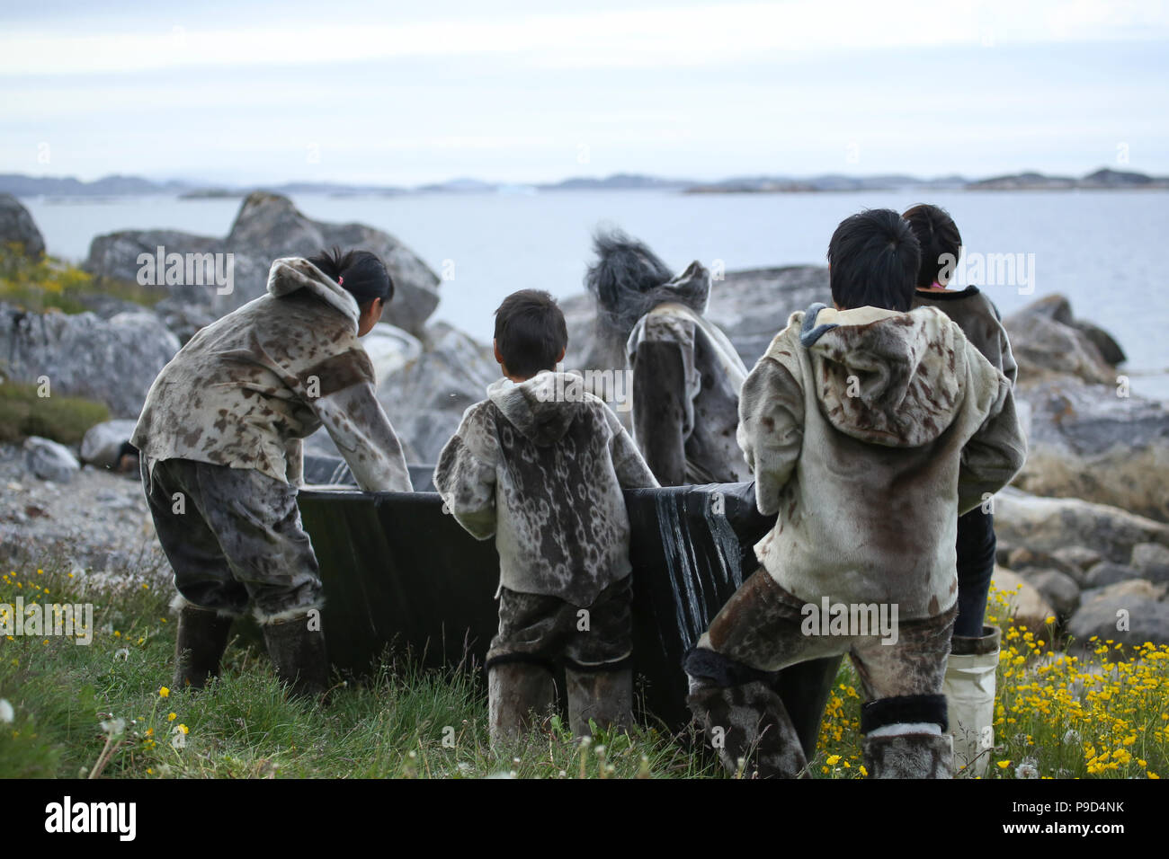 Inuit kayak demonstration, Nanortalik, Greenland Stock Photo