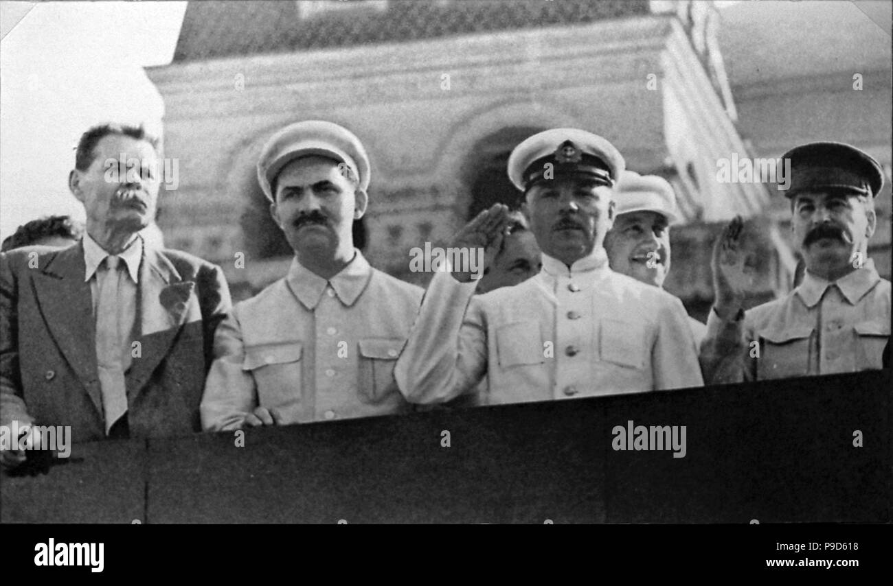 Maxim Gorky, Lazar Kaganovich, Kliment Voroshilov, Joseph Stalin on Lenin's Mausoleum Tribune. Museum: State Museum of the Political History of Russia, St. Petersburg. Stock Photo