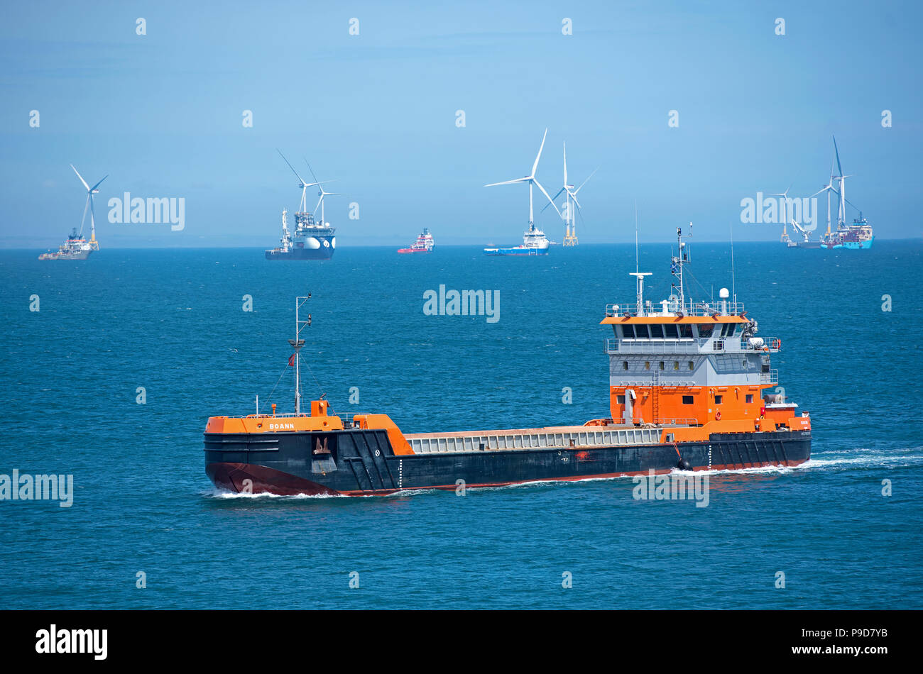 The Motor hopper vessel operating on the new harbour on the South side of Greyhope lighthouse near Aberdeen city, Scotland. Grampian Region. United Ki. Stock Photo