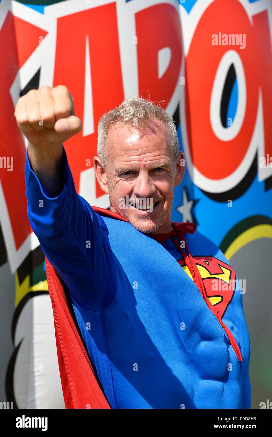 Kapow! Inflatable  5k assault course at Preston Park, Brighton for superheroes in aid of Martlets  Norman Cook Stock Photo