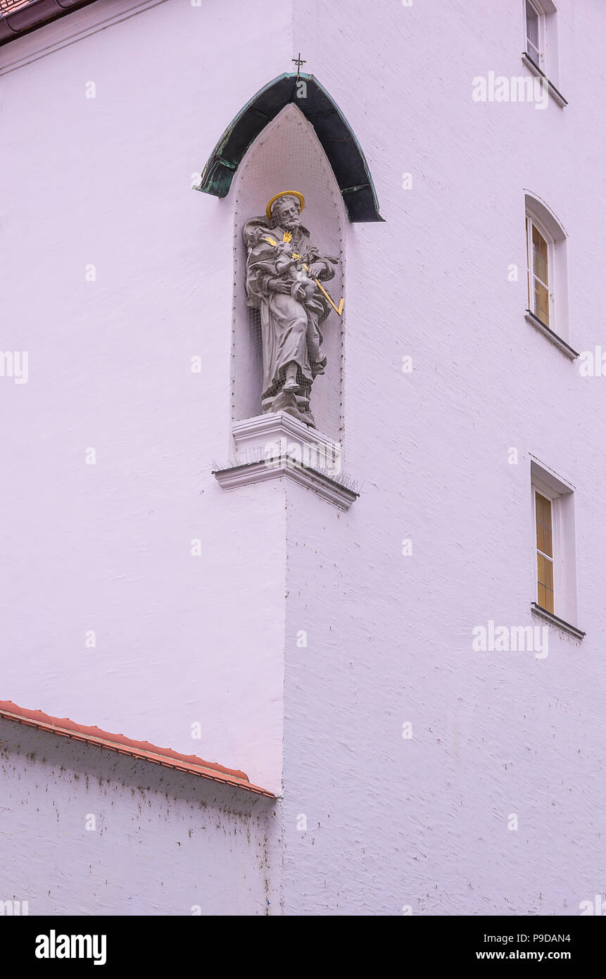 Augsburg, Bavaria, Germany - Sculpture on the exterior of the monastery of the Franciscan nuns of the Star of Mary. Stock Photo