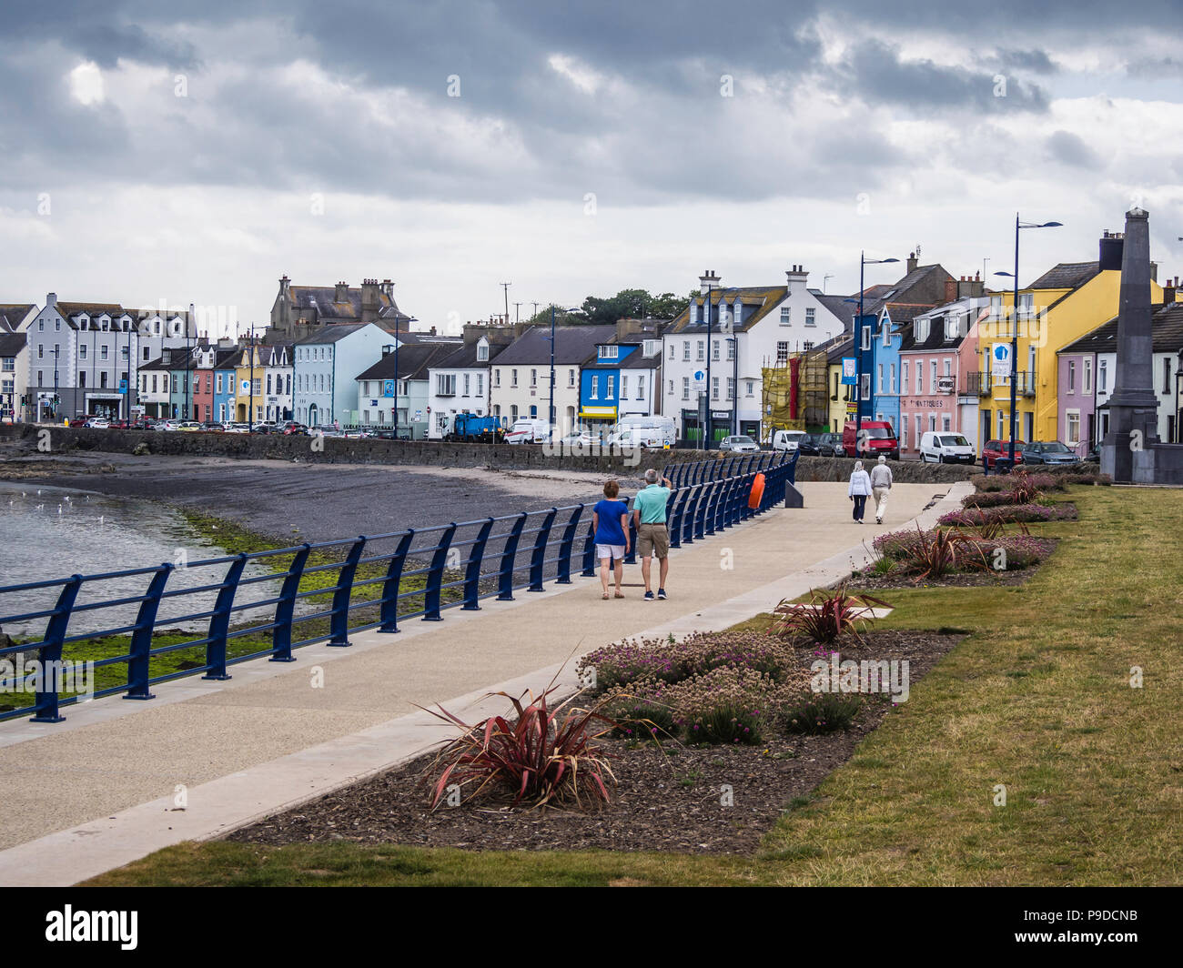 People strolling along the promenade at Donaghadee in Northern Ireland Stock Photo