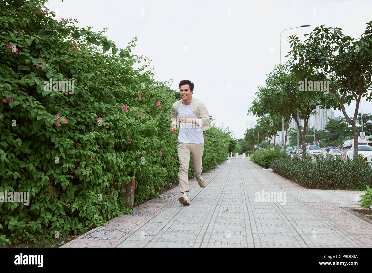 Man running in hurry hi-res stock photography and images - Alamy