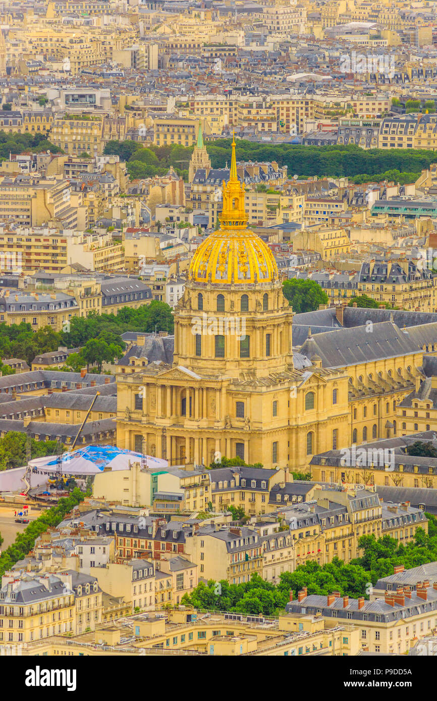 Closeup of national residence of the Invalids at sunset light from panoramic terrace of Tour Montparnasse. Aerial view of Paris urban skyline, Capital of France in Europe. Vertical shot. Stock Photo