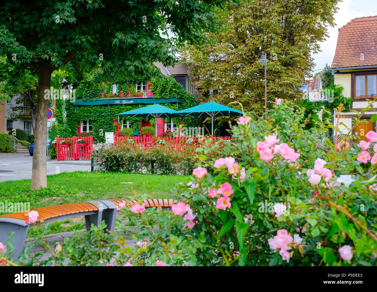 Strasbourg, Restaurant La Vignette, ivy-covered house, flowered garden, bench, Alsace, France, Europe, Stock Photo