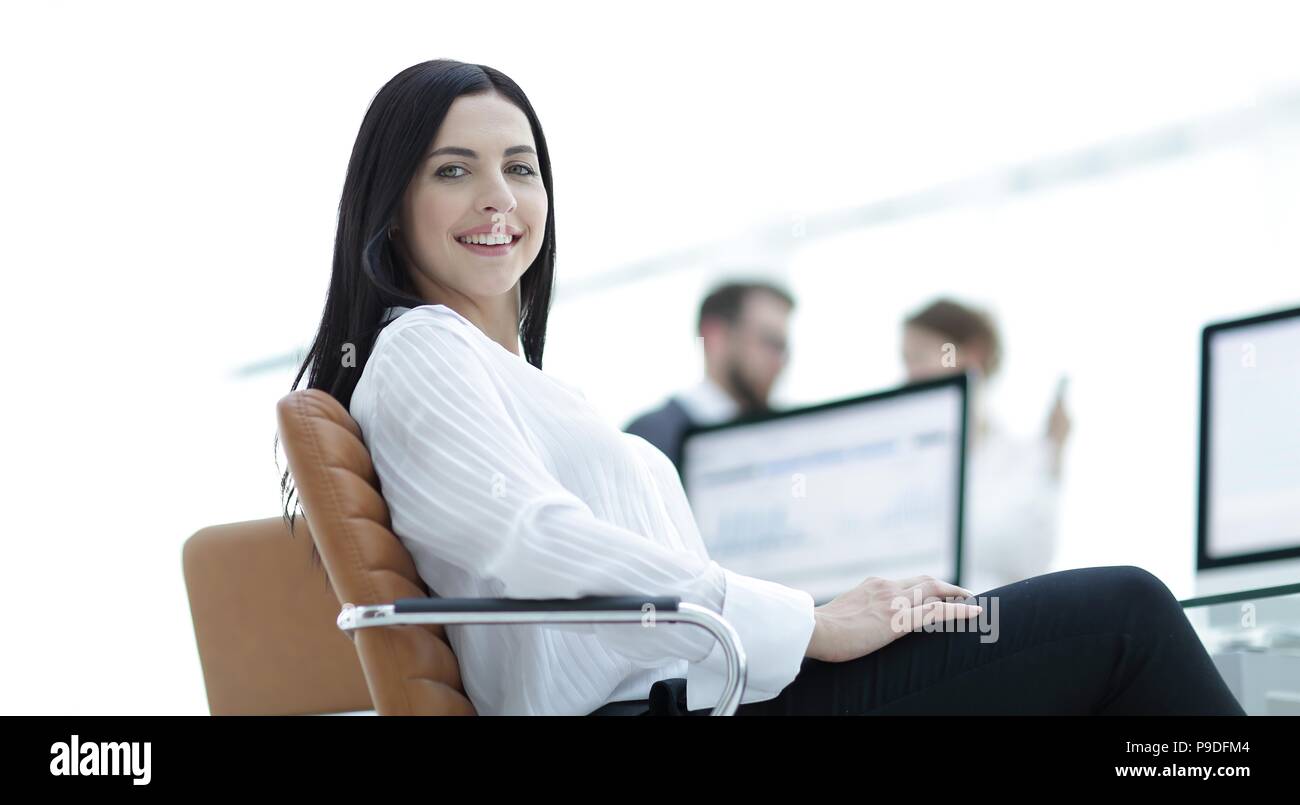 successful young business woman on the background of a workplace Stock ...
