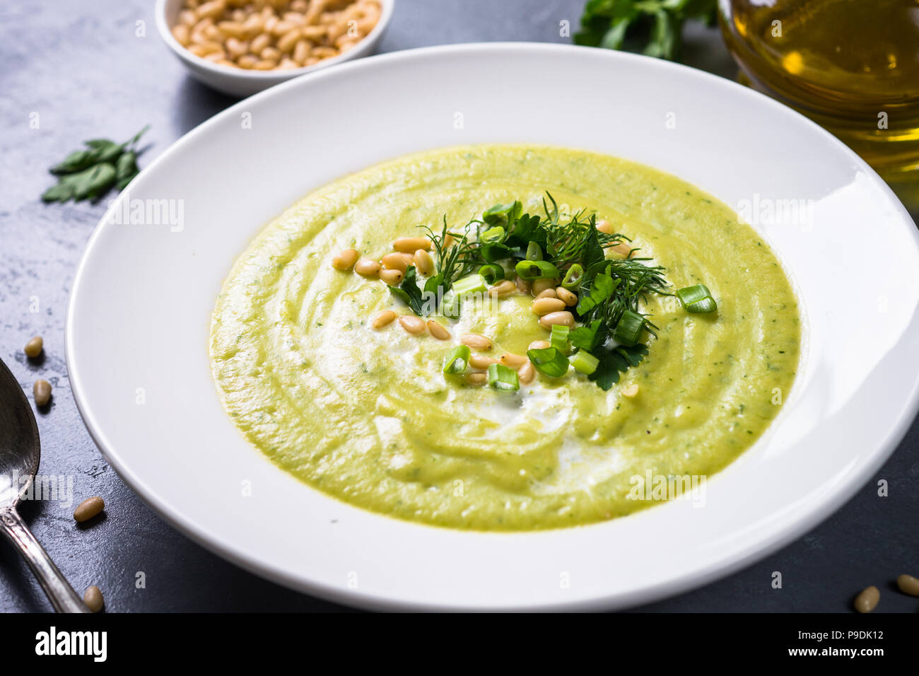 Cream soup with zucchini, herbs and cream.  Diet food, meatless dish. Stock Photo