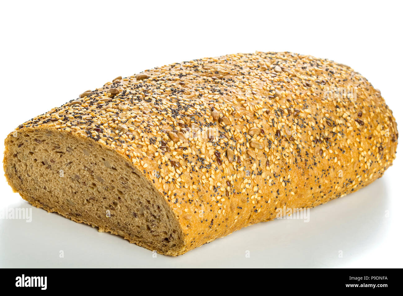 Bread covered with different types of seeds isolated over white background Stock Photo