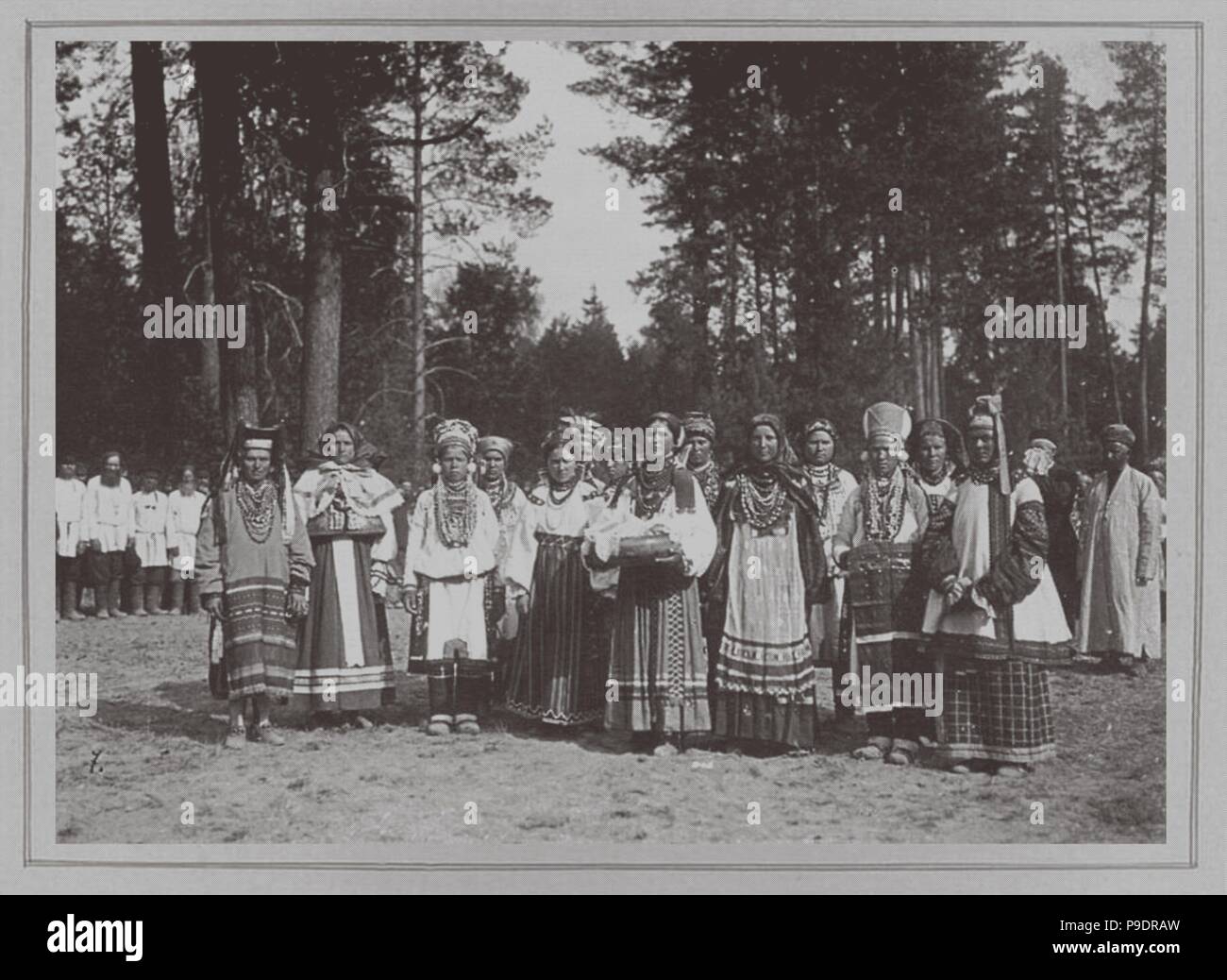 Peasants in festive dress of Tambov region waiting the Tsar Nicholas II. Museum: Institute for the History of Material Culture, St. Petersburg. Stock Photo