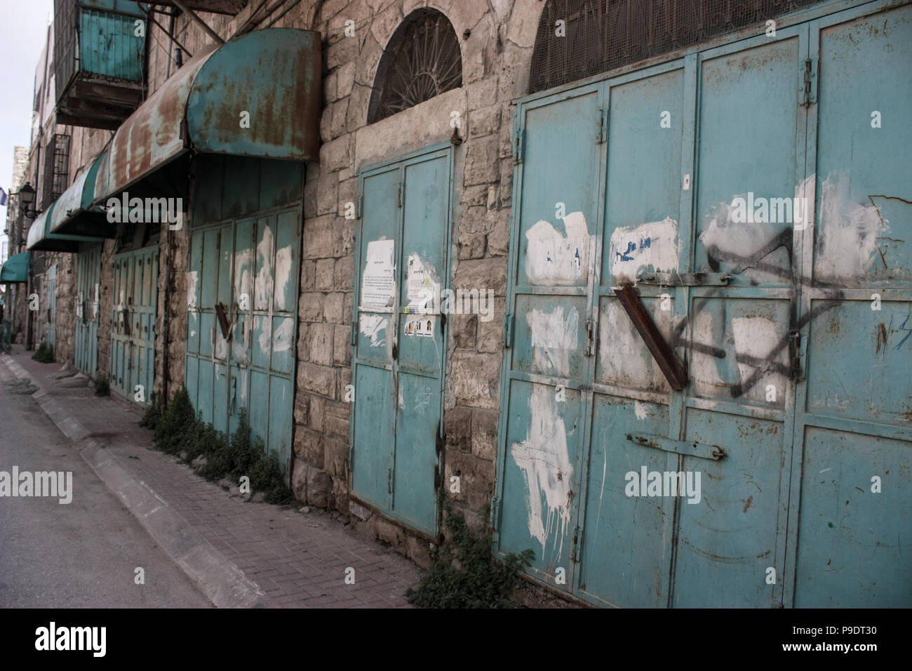 Shops welded tight by the Israeli Defense Forces in apparent protection for their illegal settlers Stock Photo