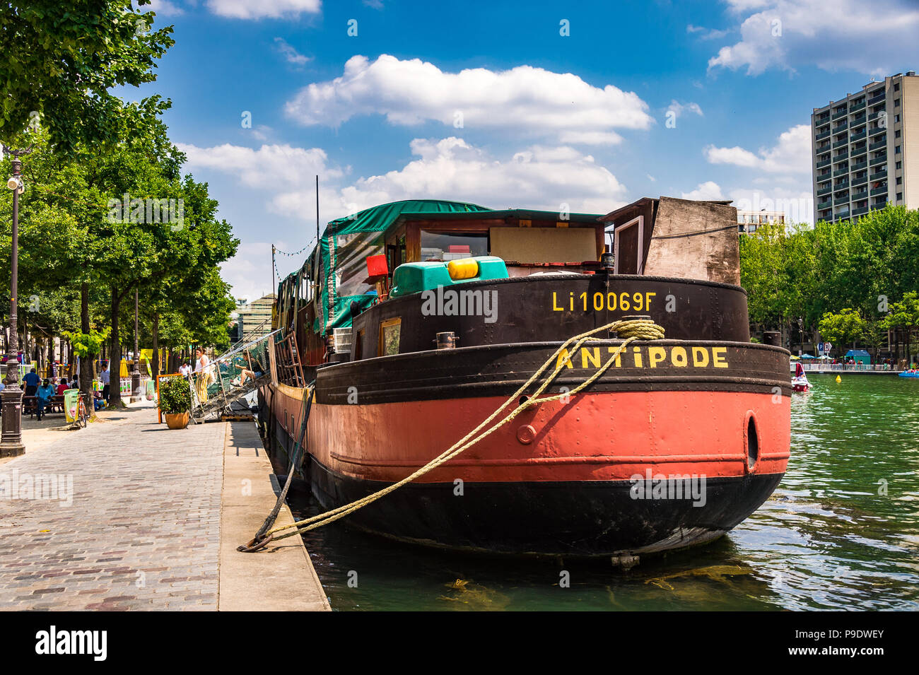 Boat docked in Bassin de la Villette Stock Photo