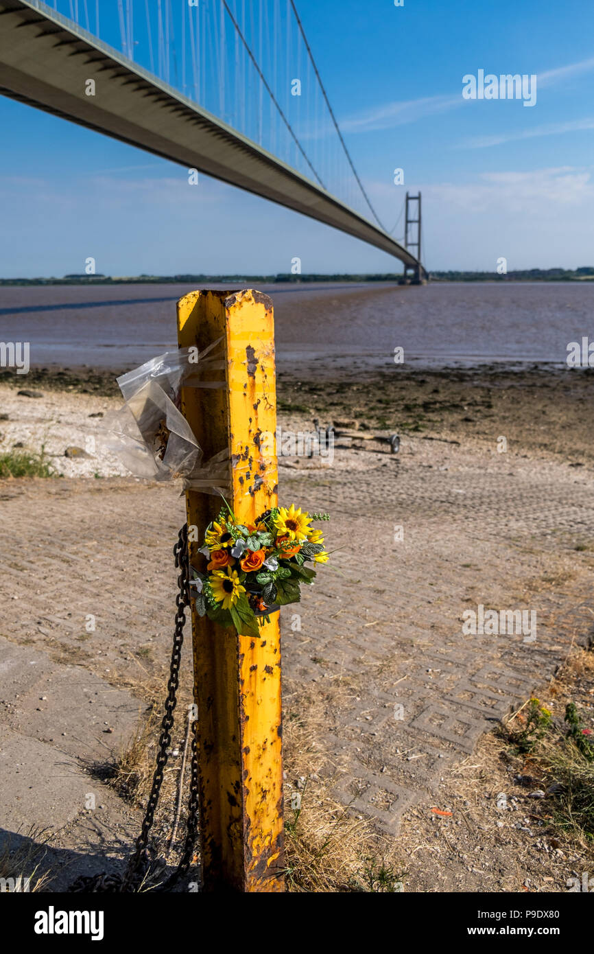 flowers which have passed their best in memory of someone who passed