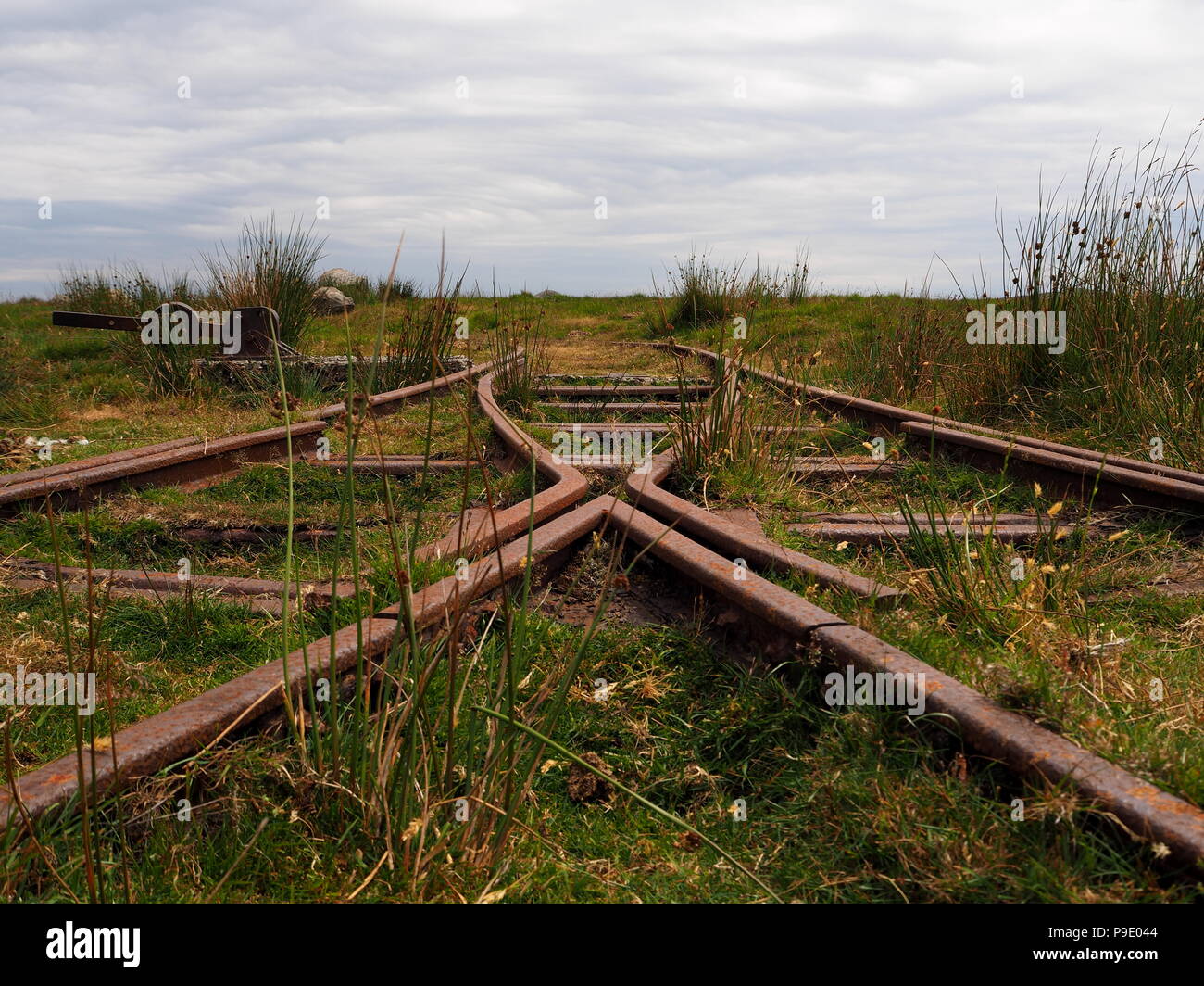 Rusty track and points of the remote disused Rowtor Target Railway, Dartmoor Stock Photo