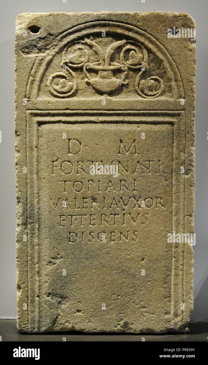 Funerary stele of gardener (topiarius) Fortunato. To the gardener Fortunato, his wife Valeria and student Tertius. From Como. Mid 1st century AD. Marble. Archaeological Museum. Milan. Italy. Stock Photo