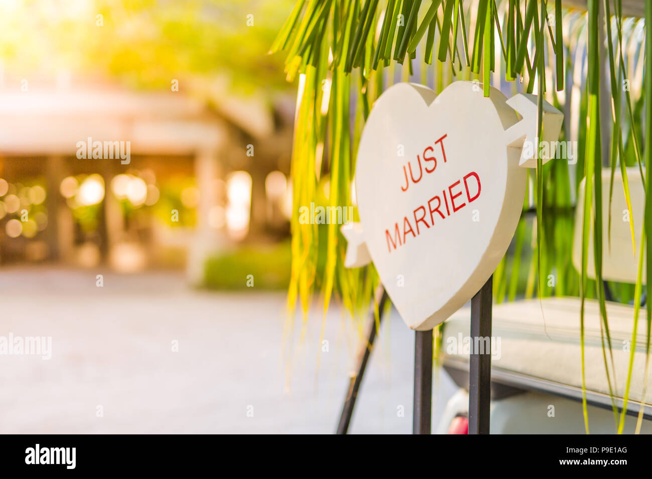 Just married sign on wooden table, tropical wedding background. Happy image of wedding concept background Stock Photo