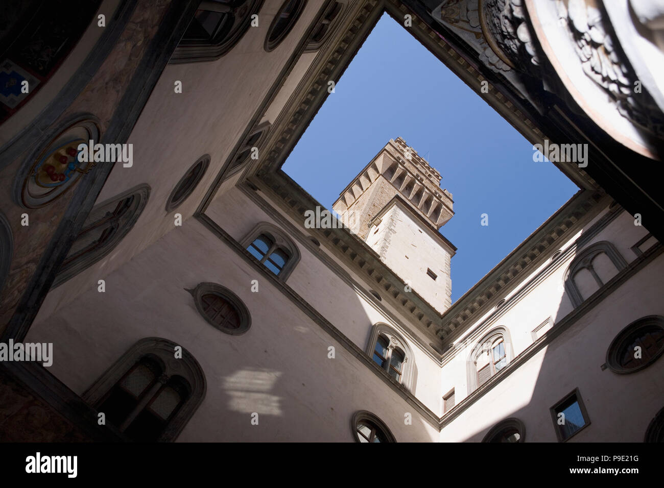 The tower (Torre d'Arnolfo) from the First Courtyard, Palazzo Vecchio, Florence, Tuscany, Italy Stock Photo
