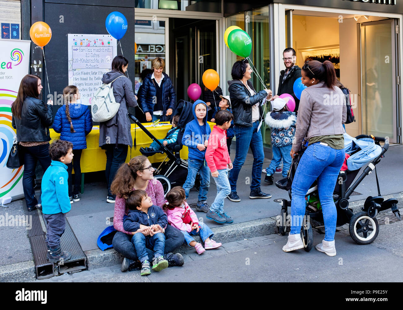 Basel, balloons charity sale on pavement, rising fund, funds,Familea child care center, parents and children, Switzerland, Europe, Stock Photo