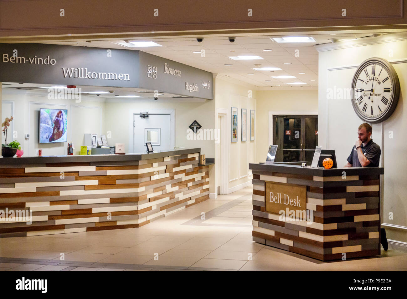 Orlando Florida,Doubletree by Hilton Orlando SeaWorld,hotel,property grounds,lobby,interior inside,front bell desk check-in reservations,man men male, Stock Photo