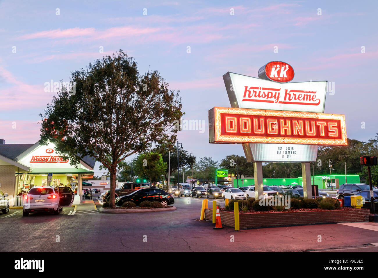 Krispy kreme doughnuts neon sign night nightlife hires stock