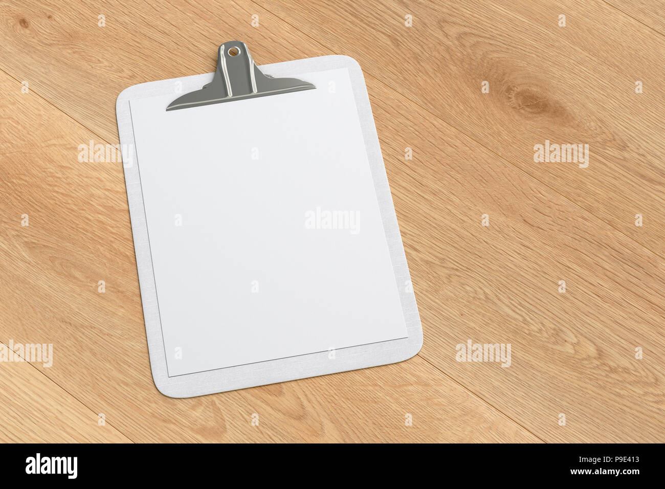 White clipboard with blank white paper pages isolated on wooden ...