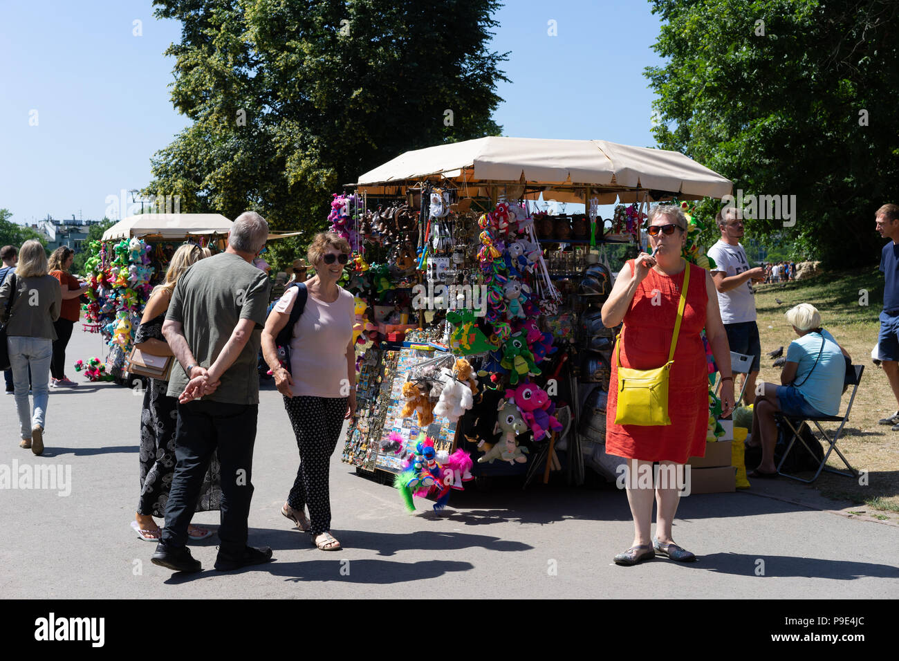 Tourists in a park in Krakow, Poland, Europe. Stock Photo