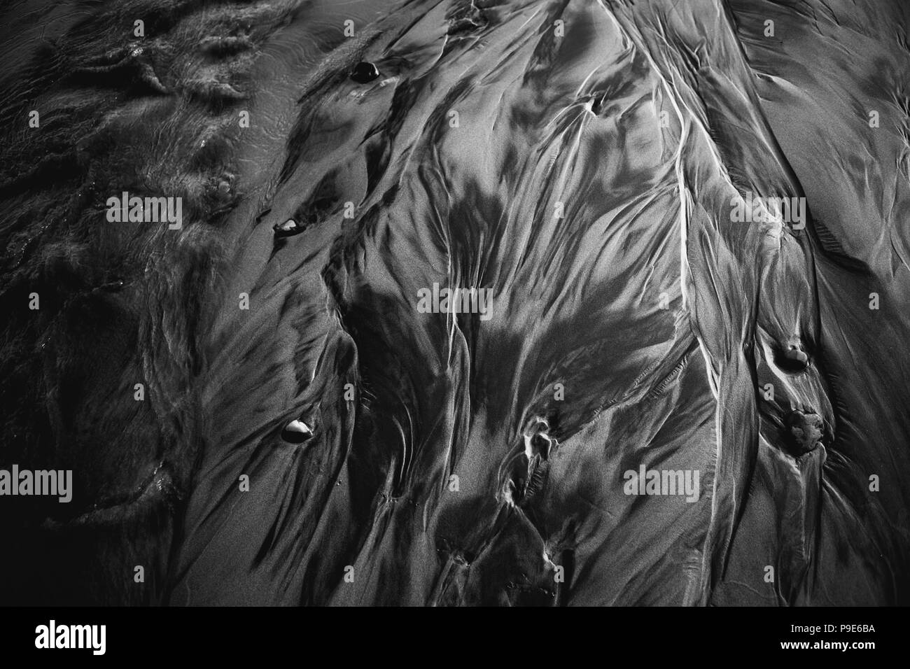 Detail of beach sand and patterns at low tide, Arcadia Beach State Park