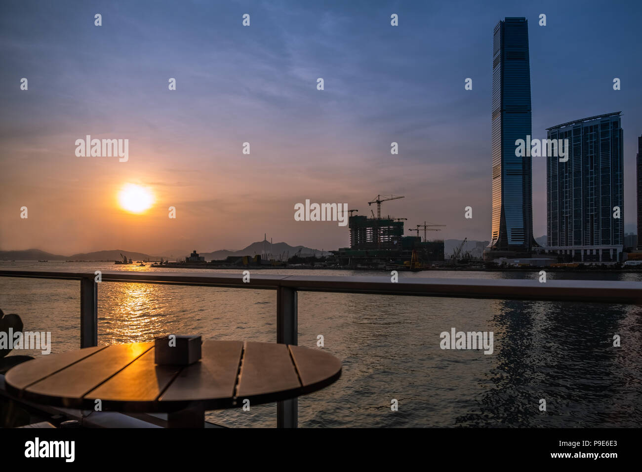 Sunset of Victoria Harbor of Hong Kong Stock Photo - Alamy