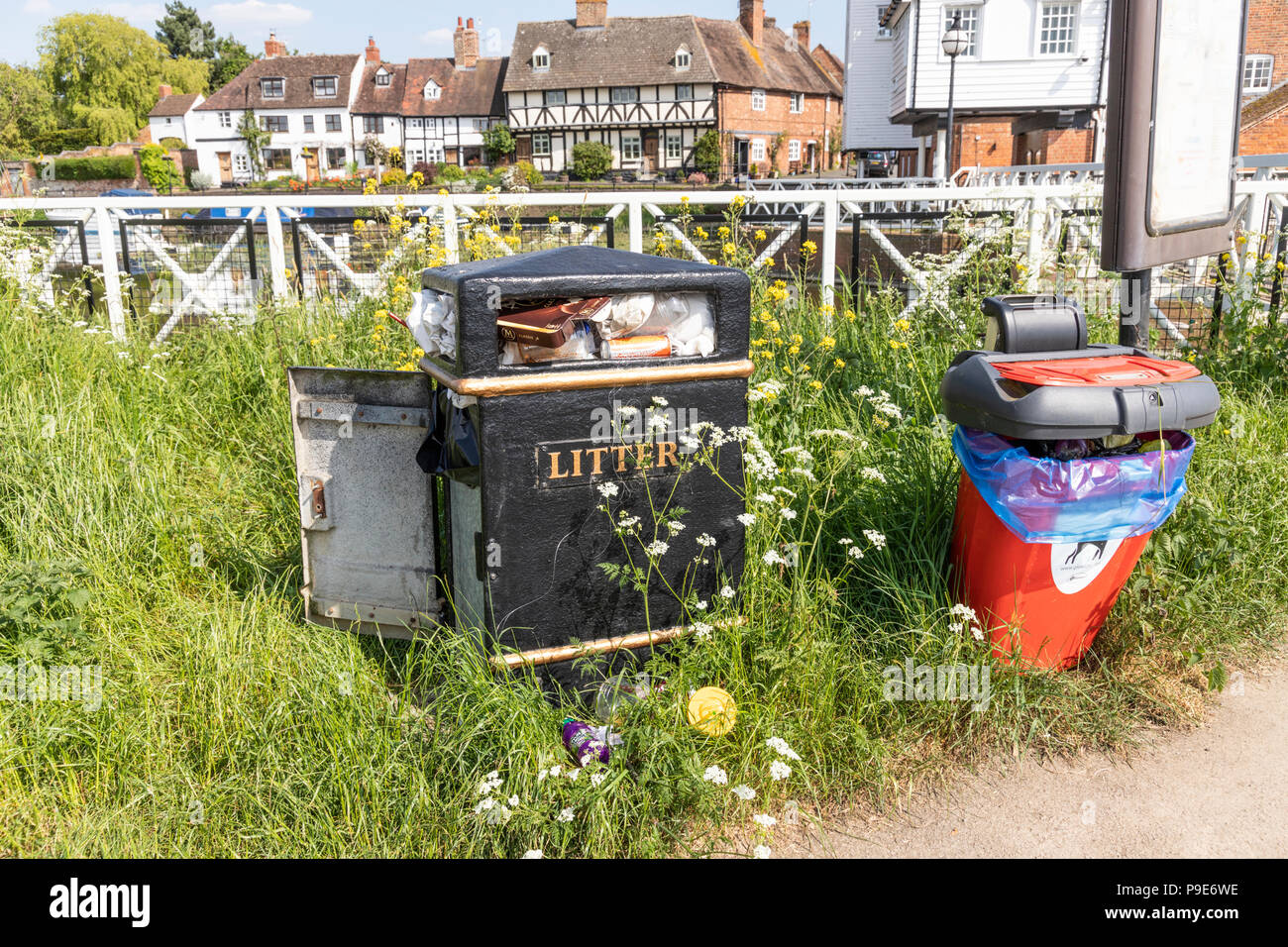 Litter bins beside the Mill Avon at Tewkesbury, Gloucestershire UK