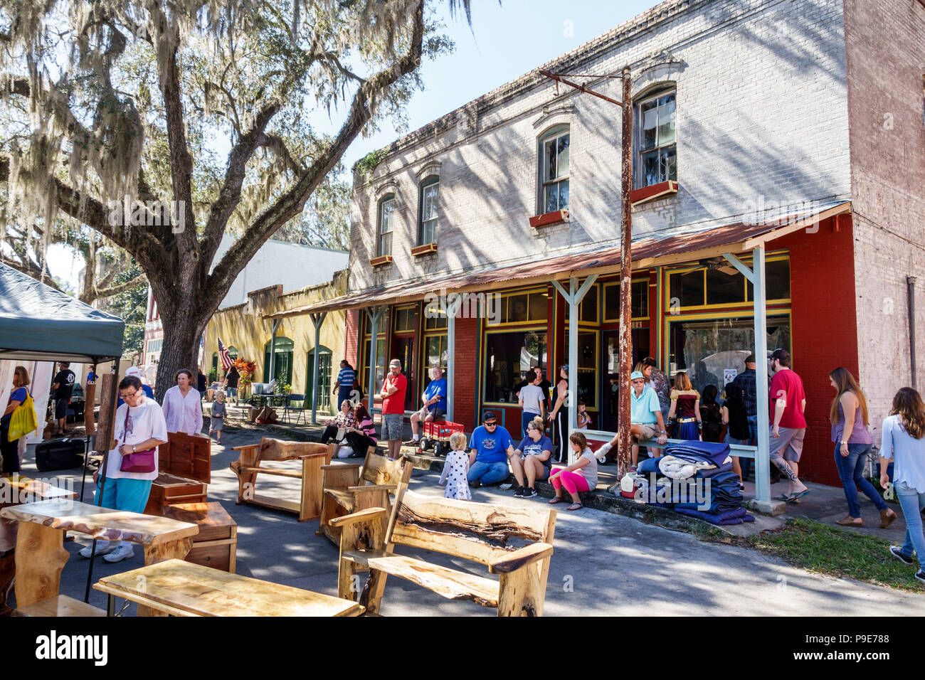 Florida,Micanopy,Fall Harvest Festival,annual small town community booths stalls vendors buying selling,general store Mott-May building,1900,historic Stock Photo