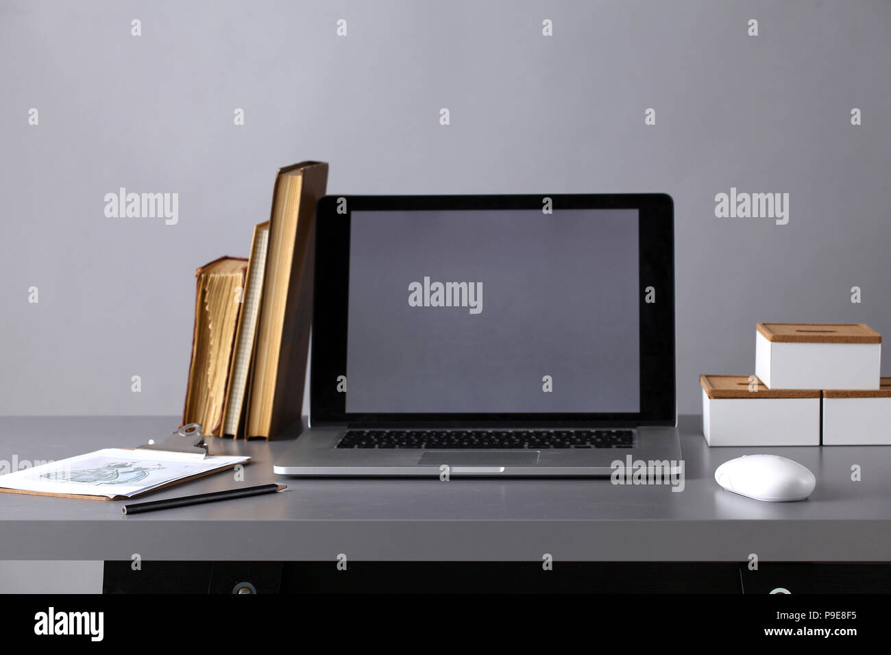 Workspace with computer and stack of papers in office Stock Photo - Alamy