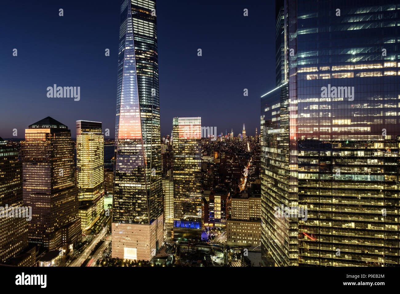World trade center and surrounding offices, high level view with colourful reflections in office windows. Stock Photo