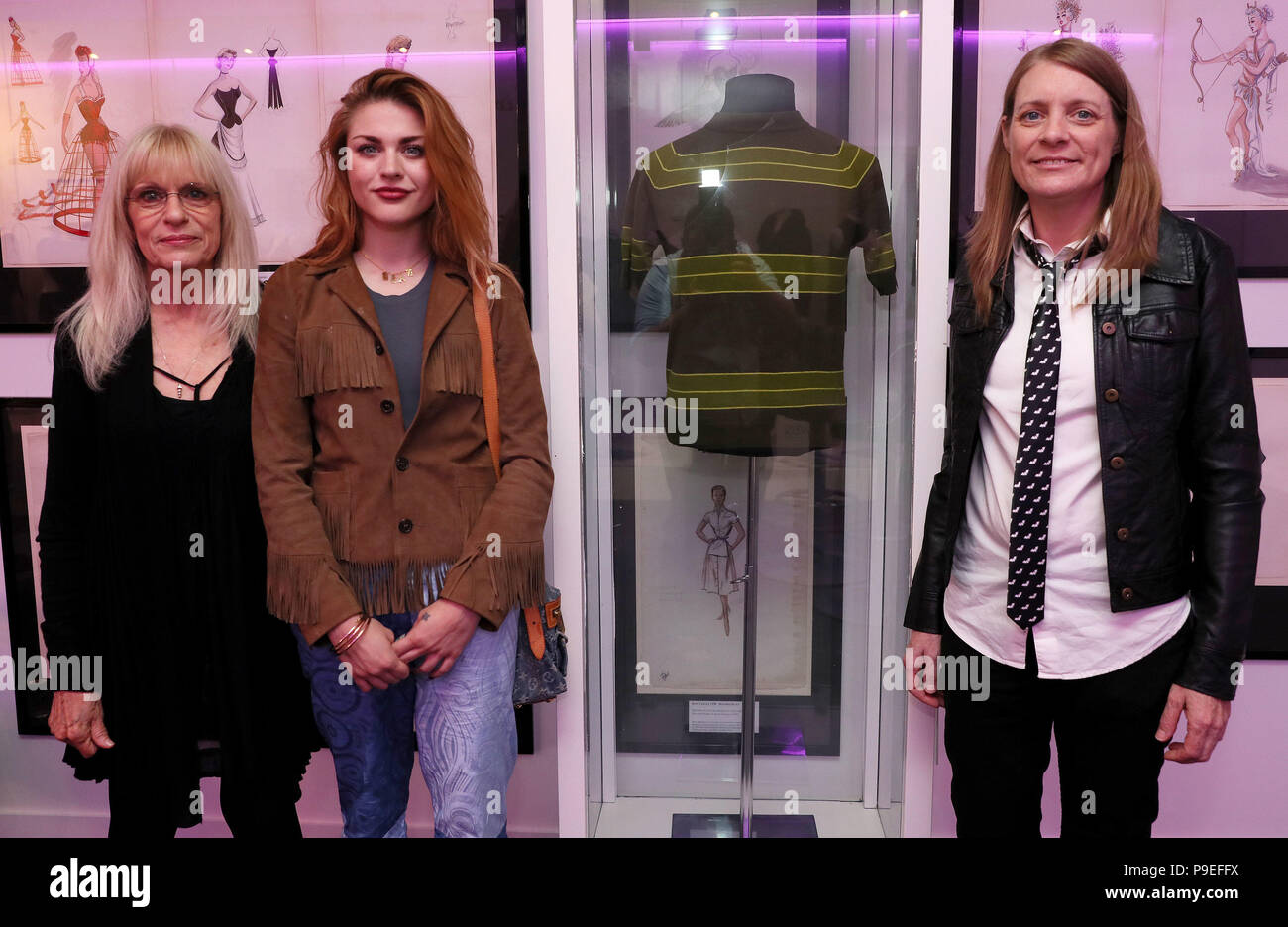 Kurt Cobain's mother Wendy O'Connor (left) daughter Frances Bean Cobain (centre) and sister Kim Cobain stand alongside his t-shirt worn in the 'Smells Like Teen Spirit' video, during the opening of the 'Growing Up Kurt' exhibition on the life of the Nirvana frontman, at the museum of Style Icons in Newbridge, Ireland. Stock Photo