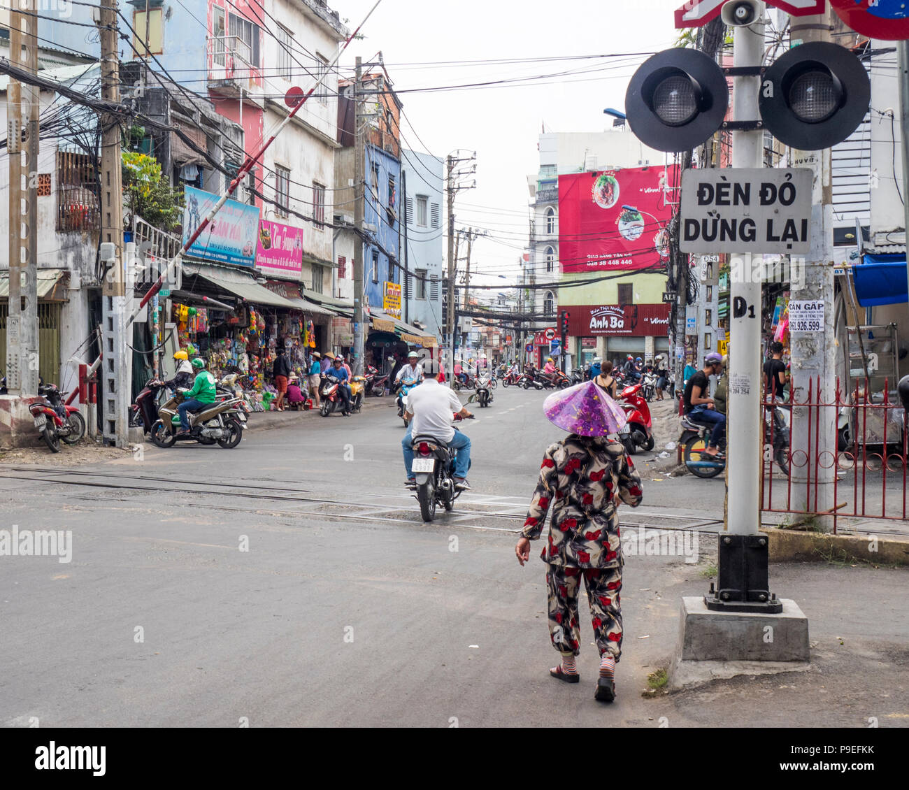 Woman Crossing Street in Vietnam Editorial Photo - Image of saigon