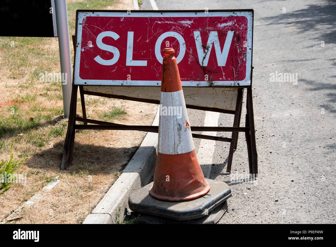 UK road sign and traffic cone Stock Photo