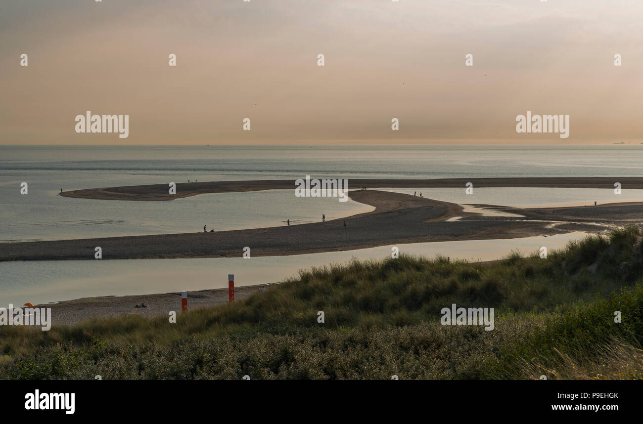 Rotterdam,Holland,16-july-2018:People late at the day waiting for sunset at the Maasvlakte beach, at eight o clock it is still 28 deg celcius this year Stock Photo