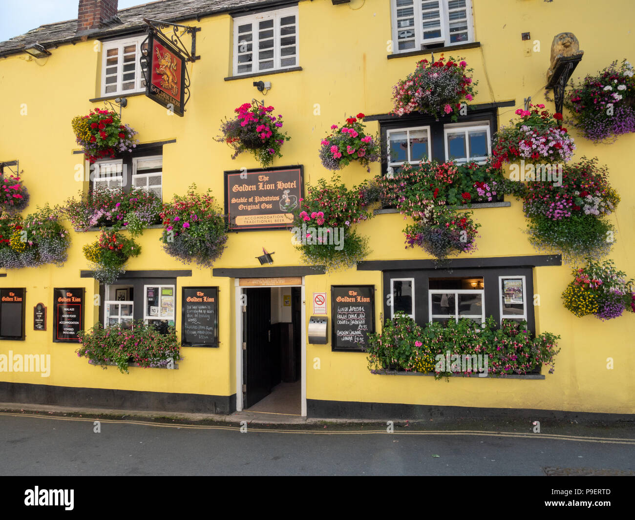 Beautiful window boxes and flower displays at the Golden Lion Hotel and pub in Padstow Cornwall UK Stock Photo