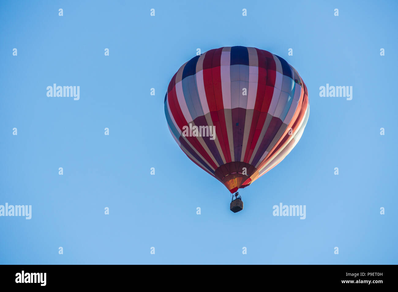 Colorful hot air balloon floating in the sky Stock Photo