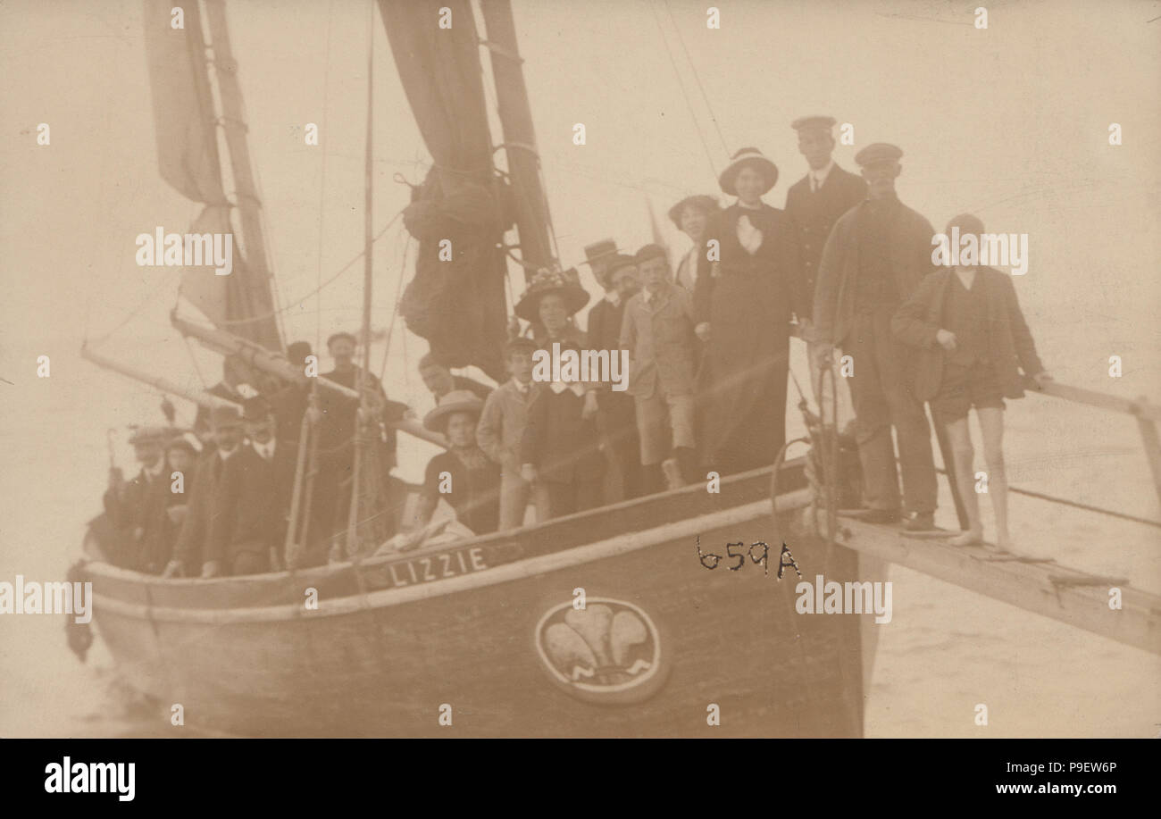 Vintage Photograph Showing a Group of Tourists on a Boat Called Lizzie Stock Photo