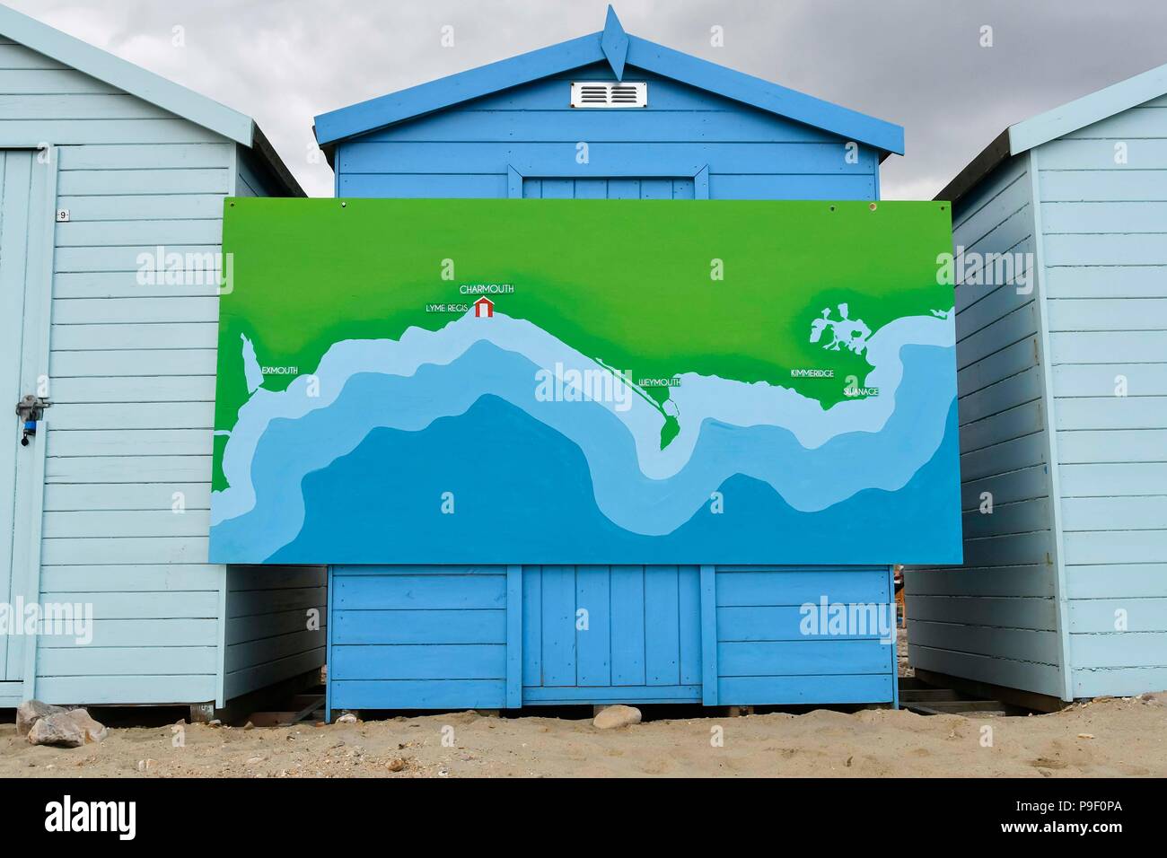 Charmouth, Dorset, UK.  17th July 2018.  A map of the Jurassic Coast on a beach hut during the filming of BBC4's Beach Live, Jurassic Coast Revealed at Charmouth beach in Dorset with presenters historian Dan Snow and natural history experts Lucy Cooke and Niall Strawson.  This was the first one hour live programme of three over 3 evenings which finishes on the 19th July.  Picture Credit: Graham Hunt/Alamy Live News Stock Photo