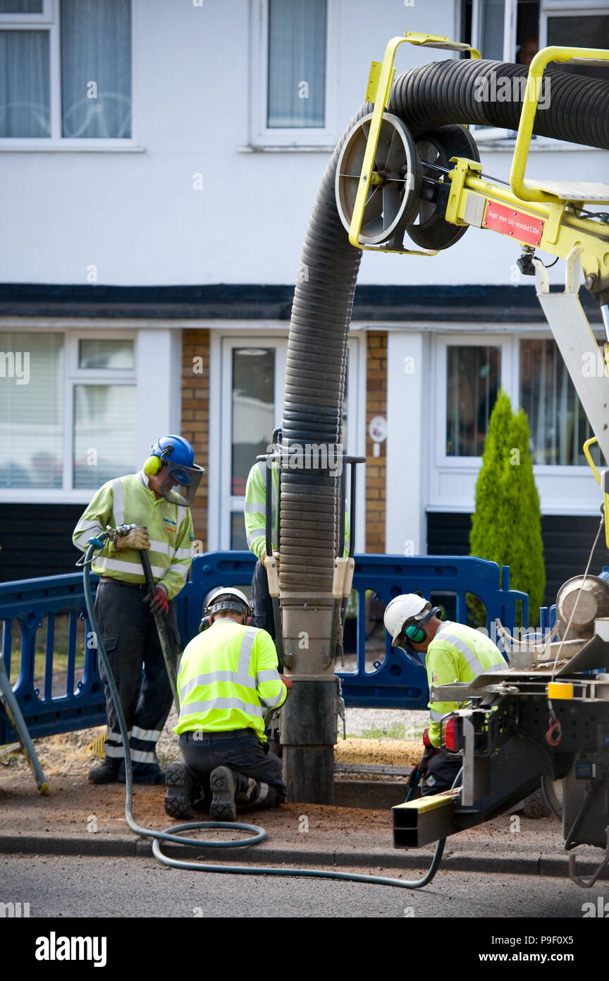 Birmingham, UK. 17th July 2018. General view Cadent employees operating a vacuum truck to suck up soil as they prepare to replace old iron gas pipes with more durable plastic yellow pipes in Birmingham, Tuesday July 17, 2018. Cadent, formerly known as National Grid Gas Distribution, are carrying out essential gas maintenance in the road. Motorists have been warned to expect delays and to find an alternative route if possible. Credit: NexusPix/Alamy Live News Stock Photo