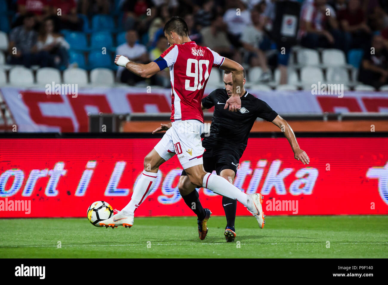 Belgrade, Serbia. 17th July, 2018. Crvena Zvezda's Lorenzo Ebecilio (L)  vies with Spartak's Vitor Silva Honorato during the first qualifying round  UEFA Champions League football match between Crvena Zvezda and Spartaks in