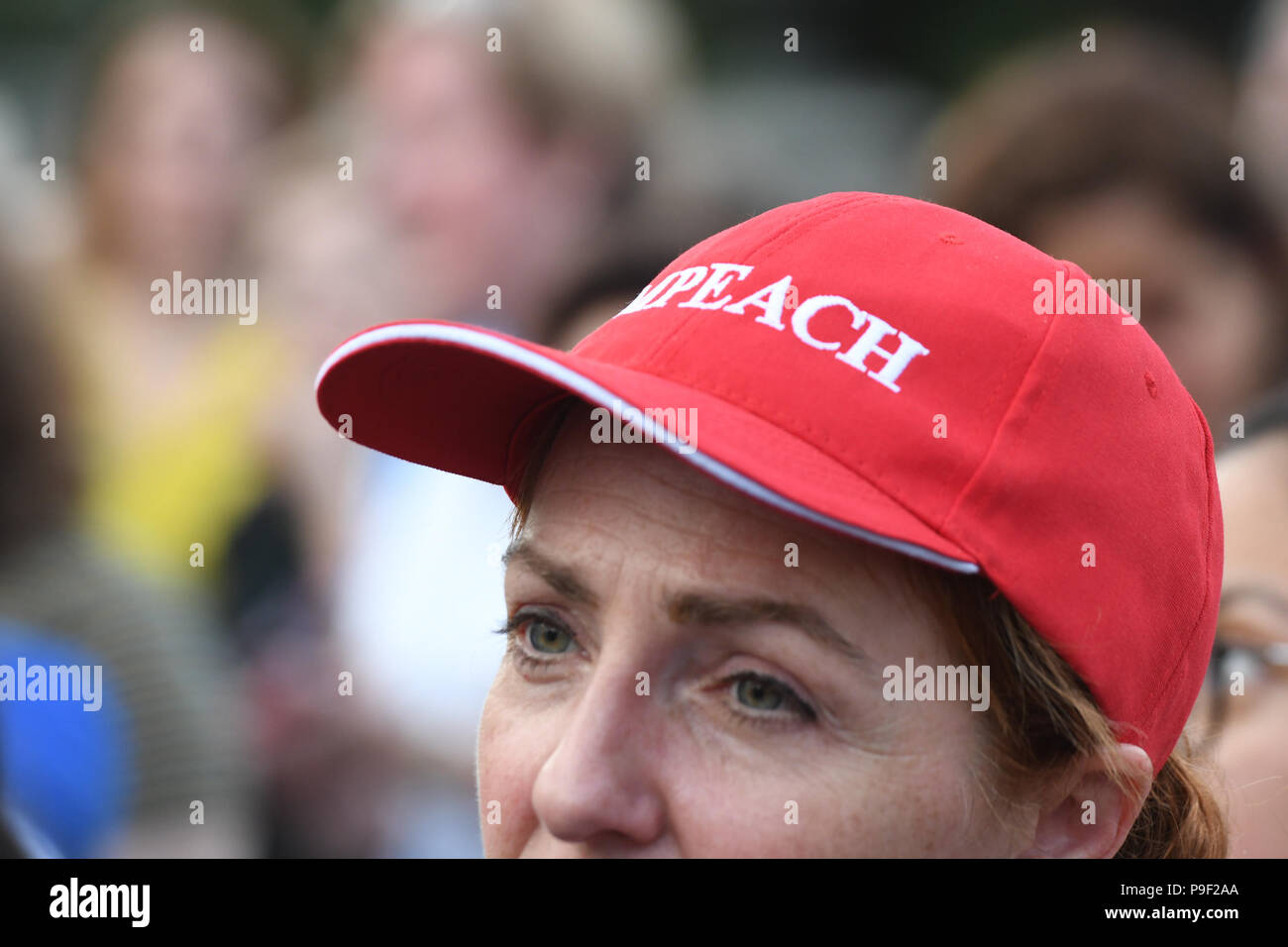 Washington DC, USA. 17th July 2018. A protester proudly wears an ''Impeach'' hat during a protest organized by Michael Avenatti in front of the White House, just two days after Donald Trump's gaffs in Helsinki, Finland with Vladimir Putin. Credit: Cal Sport Media/Alamy Live News Stock Photo