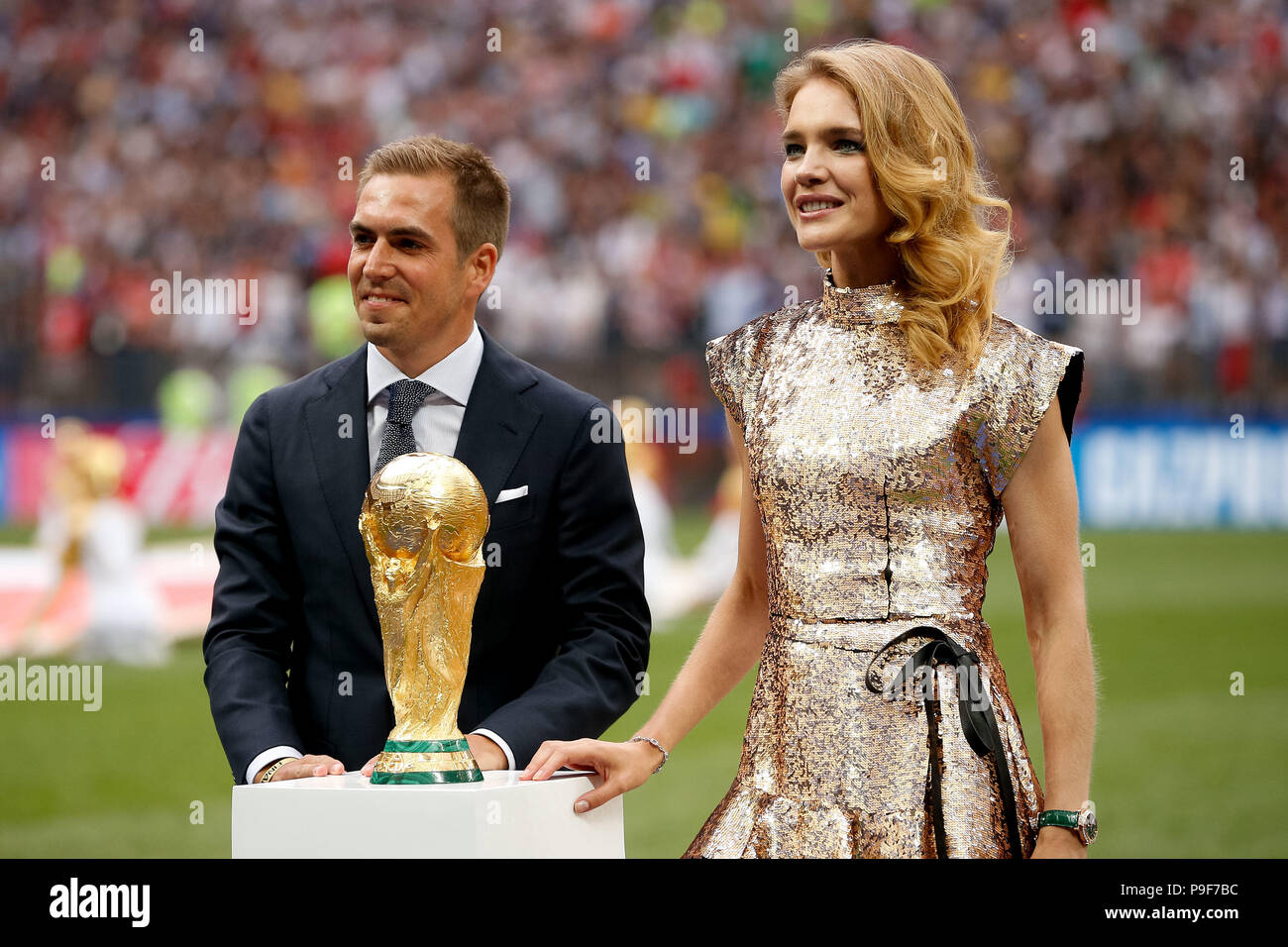 Philipp Lahm (World Champion 2014 Germany) presents the World Cup trophy  with Natalia Vodianova (r), Stock Photo, Picture And Rights Managed Image.  Pic. PAH-106679418