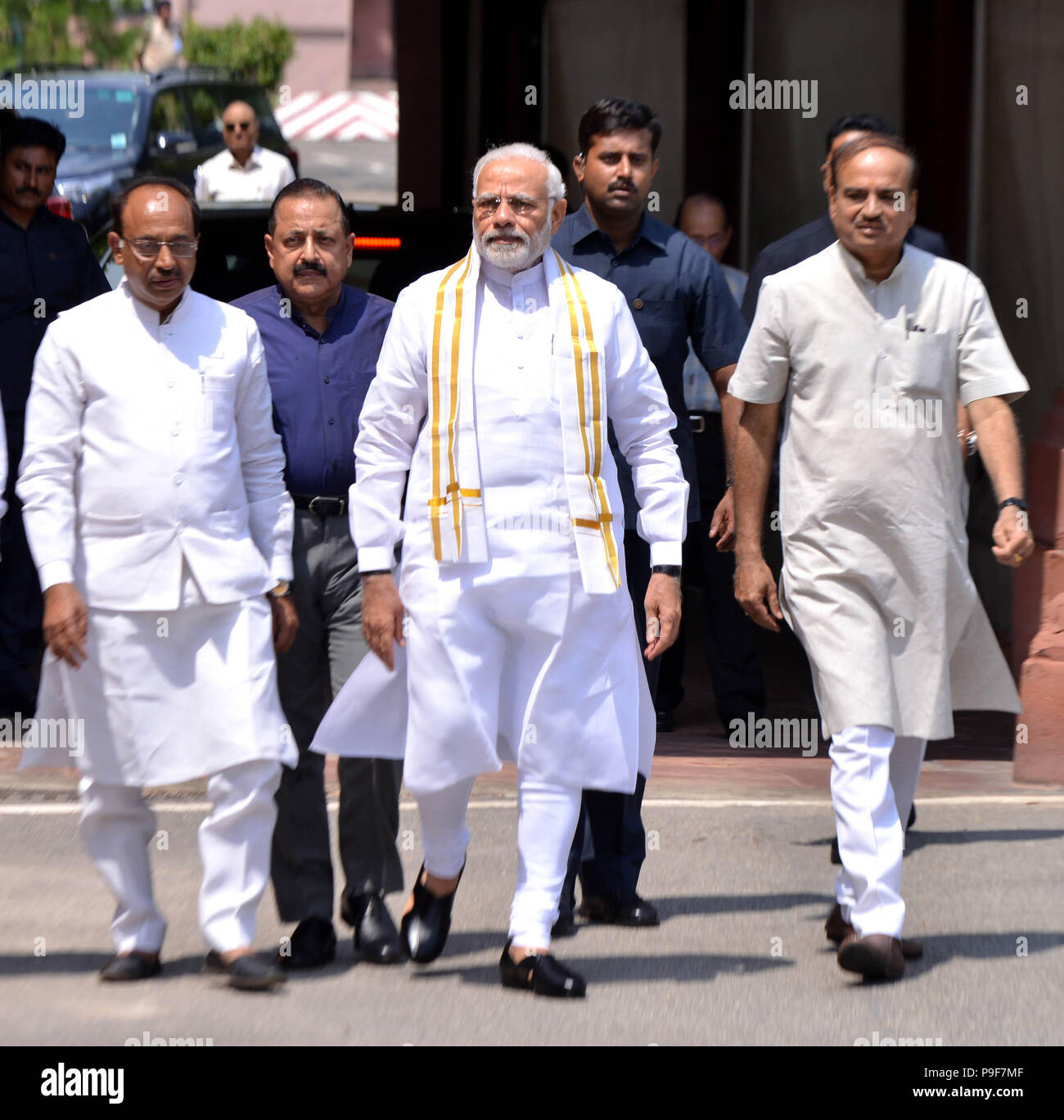 (180718) -- NEW DELHI, July 18, 2018 (Xinhua) -- Indian Prime Minister Narendra Modi (C) arrives on the opening day of the monsoon session of parliament in New Delhi, India, July 18, 2018. The monsoon session of parliament began on Wednesday and continue until August 10. (Xinhua/Partha Sarkar) (rh) Stock Photo