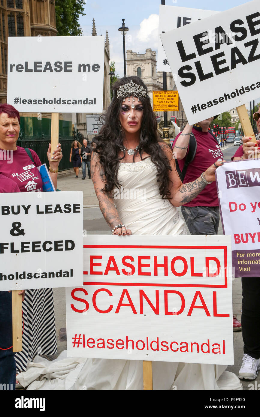 Westminster. London. UK. 18 July 2018 - Members of the National Leasehold Campaign (NLC) stage a protest opposite the Parliament over the scandal of property leaseholder rights which currently allow landlords to buy and sell property freeholds with little or no control over service charges or ground rent.   Credit: Dinendra Haria/Alamy Live News Stock Photo