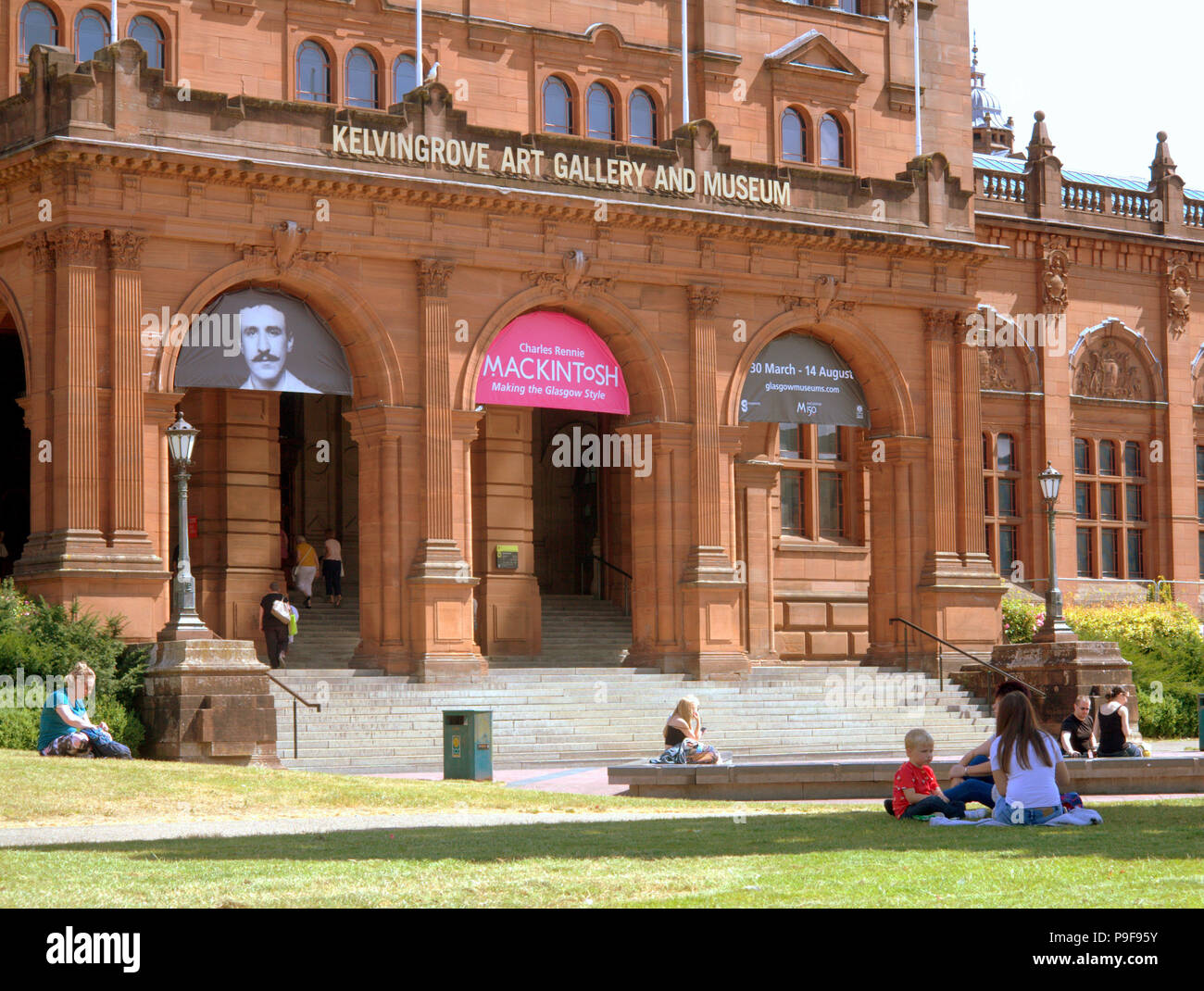 Glasgow, Scotland, UK 18th July. UK Weather:Sunny weather brings out locals and tourists in the city.s Partick at the Kelvingrove art galleries and museum mackintosh exhibition  in the west end to enjoy the warm weather of the middle of summer. Gerard Ferry/Alamy news Stock Photo