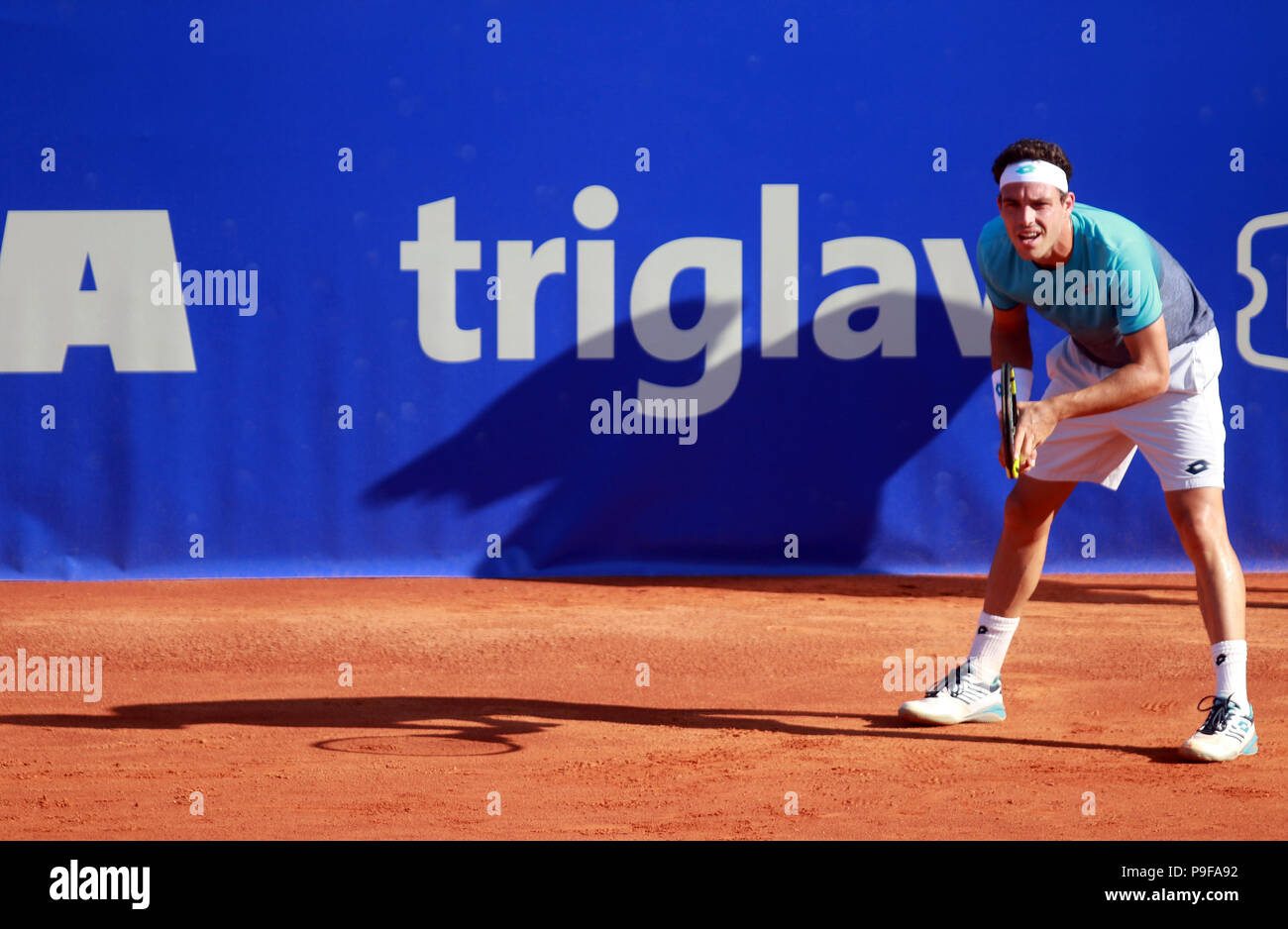 Umag, Croatia. 18th July 2018. CROATIA, Umag: Marco Cecchinato of Italy prepares to receive against Jiri Vesely during the singles match Vesely v Cecchinato at the ATP 29th Plava laguna Croatia Open Umag tournament at the at the Goran Ivanisevic ATP Stadium, on July 18, 2018 in Umag. Credit: Andrea Spinelli/Alamy Live News Stock Photo