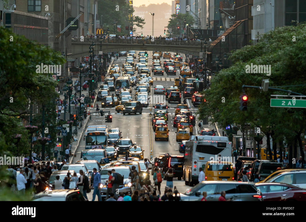 Congestion of pedestrians and cars in Manhattan, New York City. Stock Photo