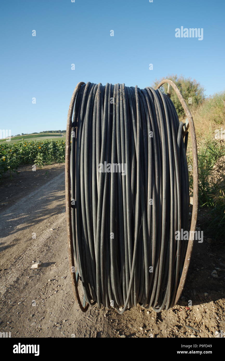 Stored irrigation piping Stock Photo